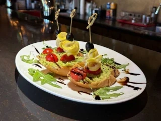 Tomato and avocado bruschetta selection