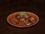 Warm young beef salad