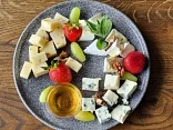 Cheese selection with honey and nuts